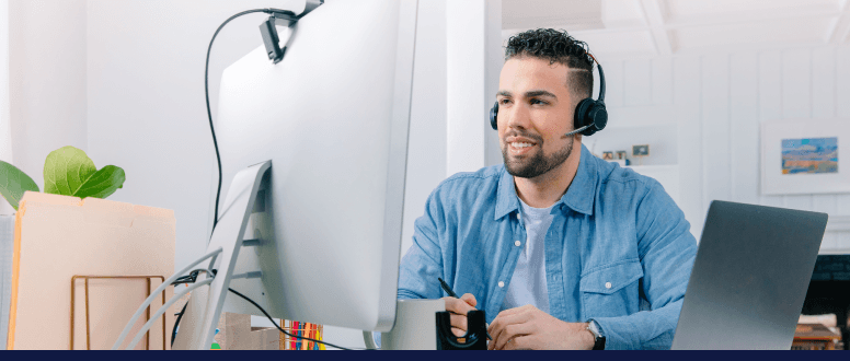 Contact centre advisor on a call, smiling